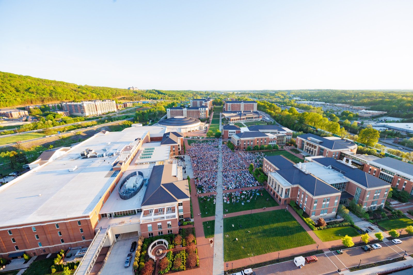 An elevated view of campus buildings and the central lawn
