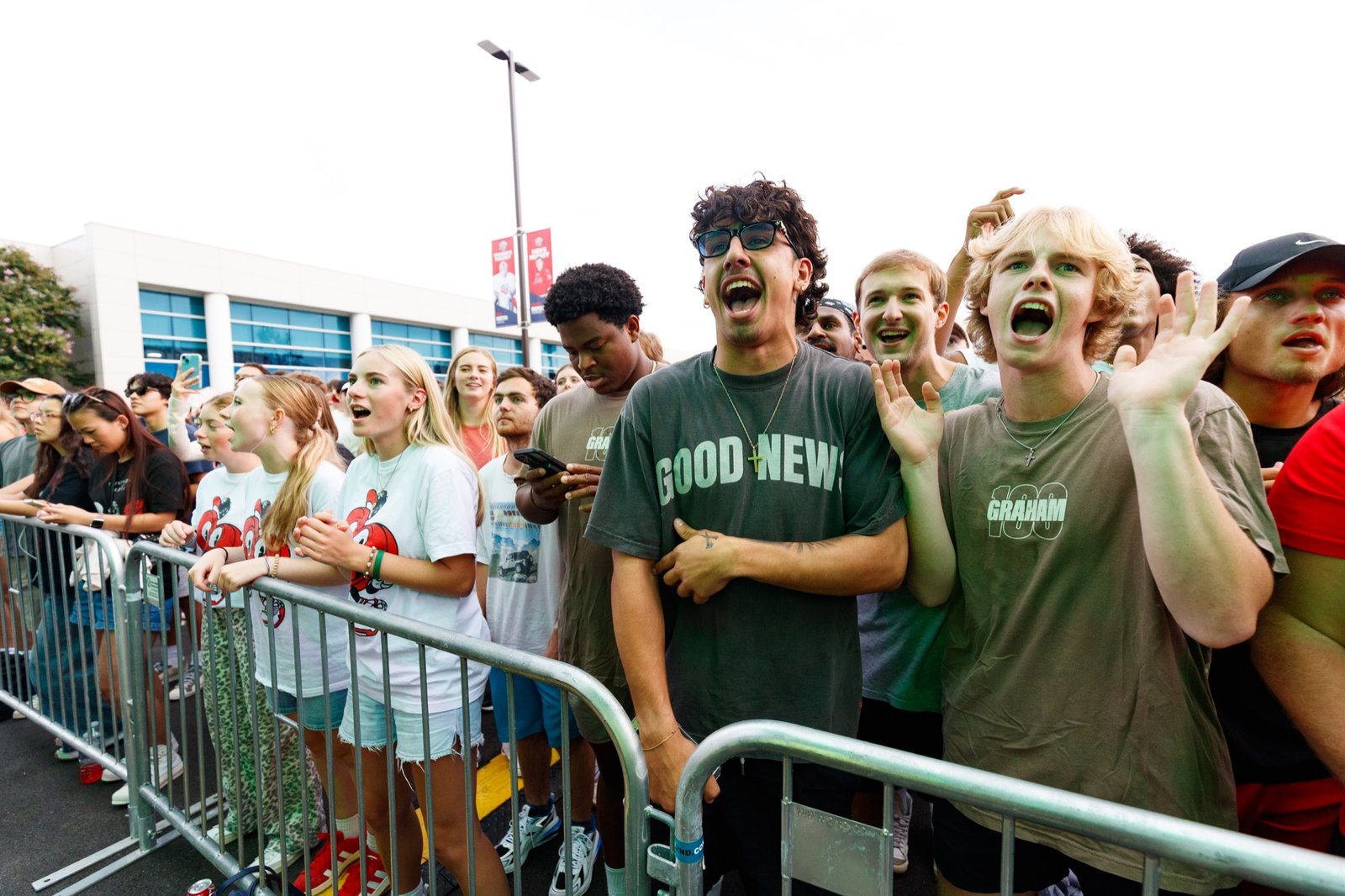 Students react from the front row of the Block Party crowd