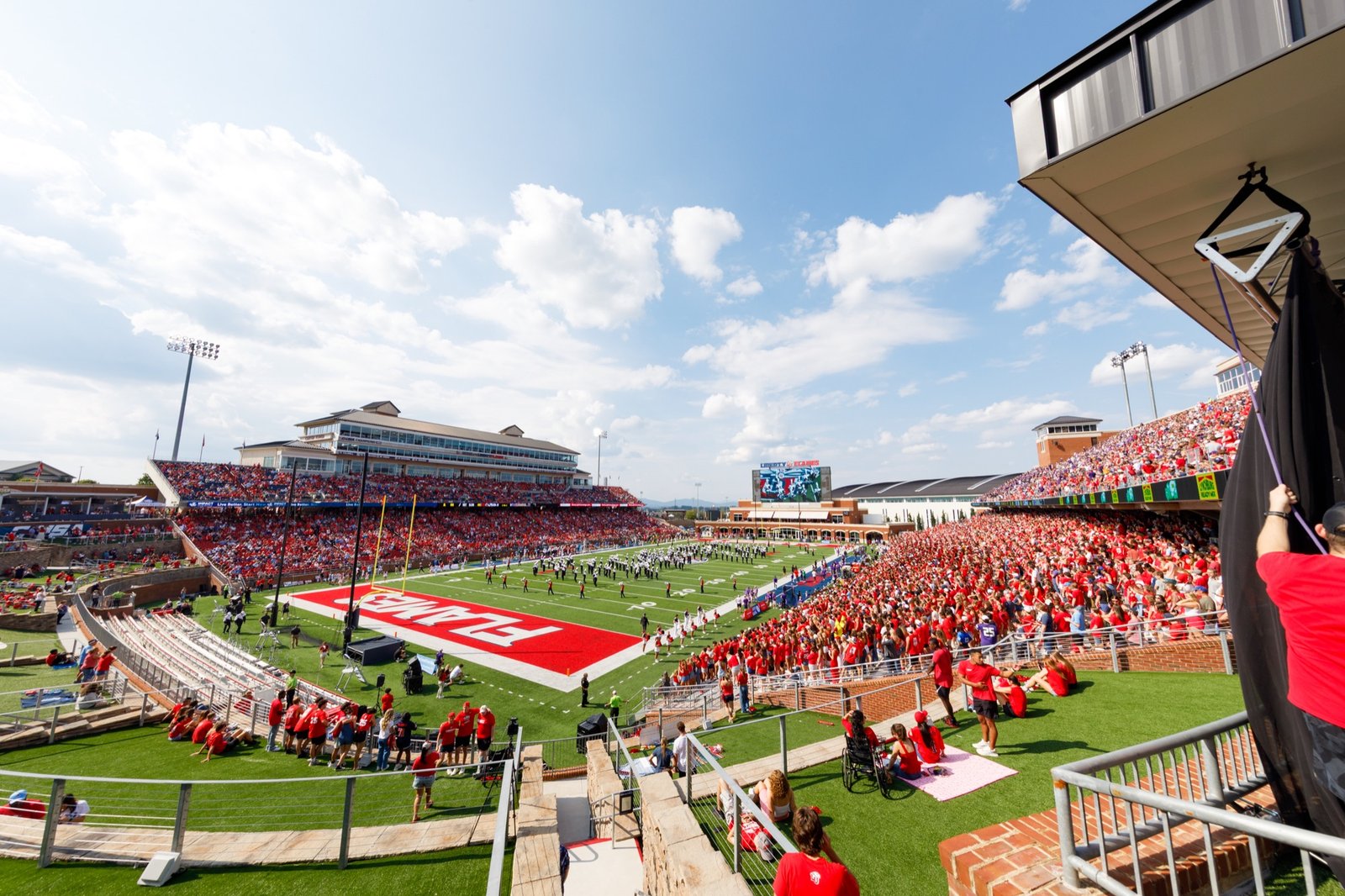 A wide view of the football stadium on game day